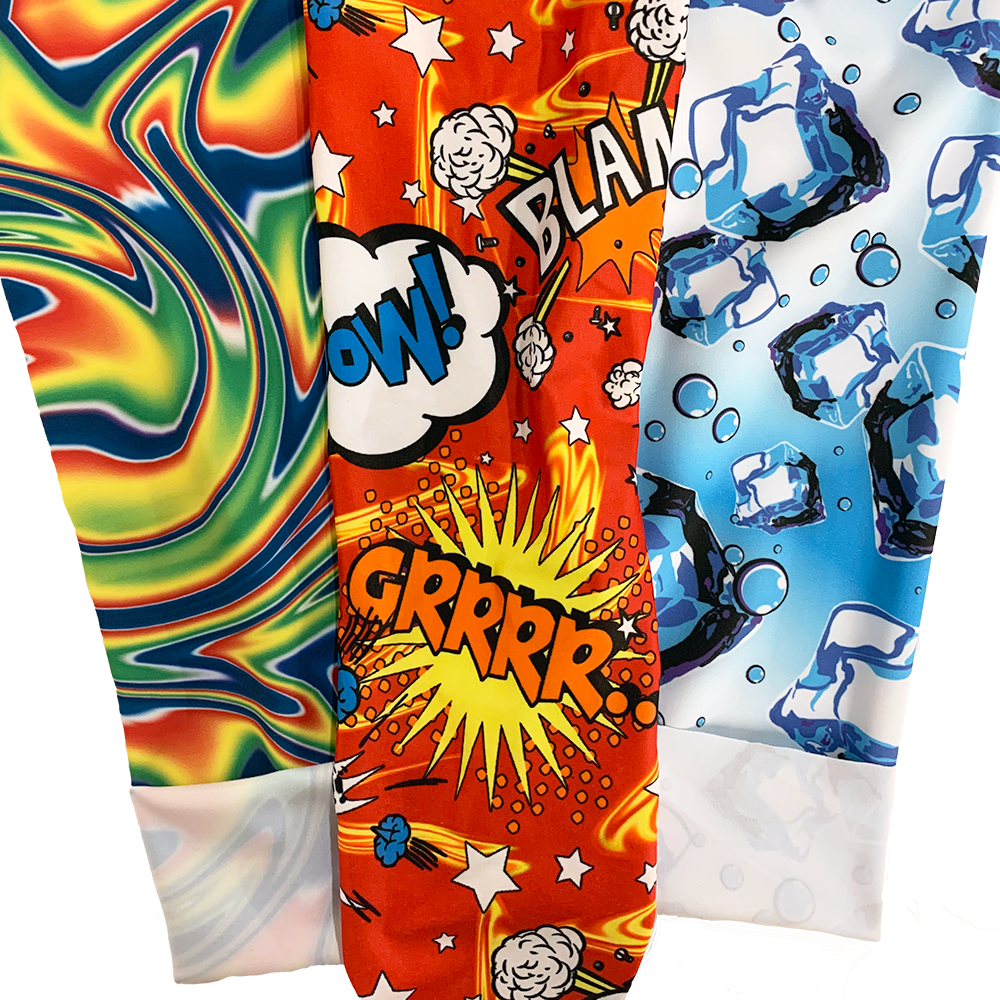 Stretch fabrics in coloured swirls, cartoon words and a blue ice design