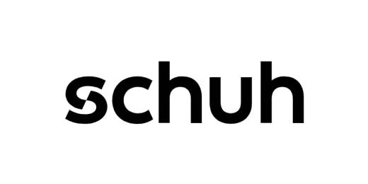 schuh written in bold black font, with the S made of two front parts of a shoe.