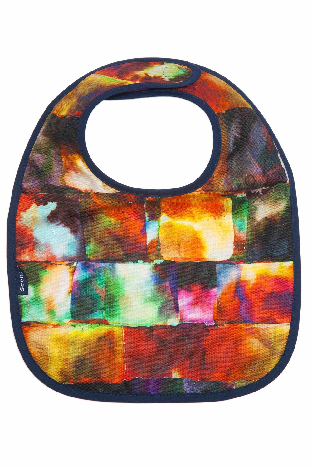 Bib with a colourful square tie dye patten in absorbent fabric