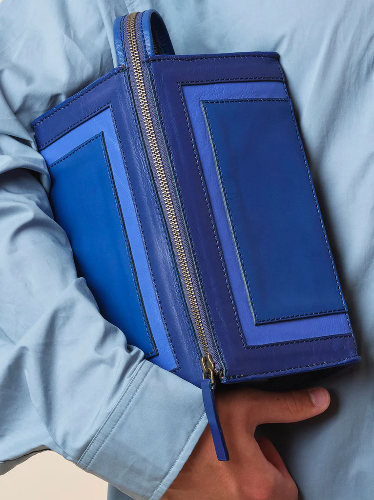 Travel bag in electric blue leather