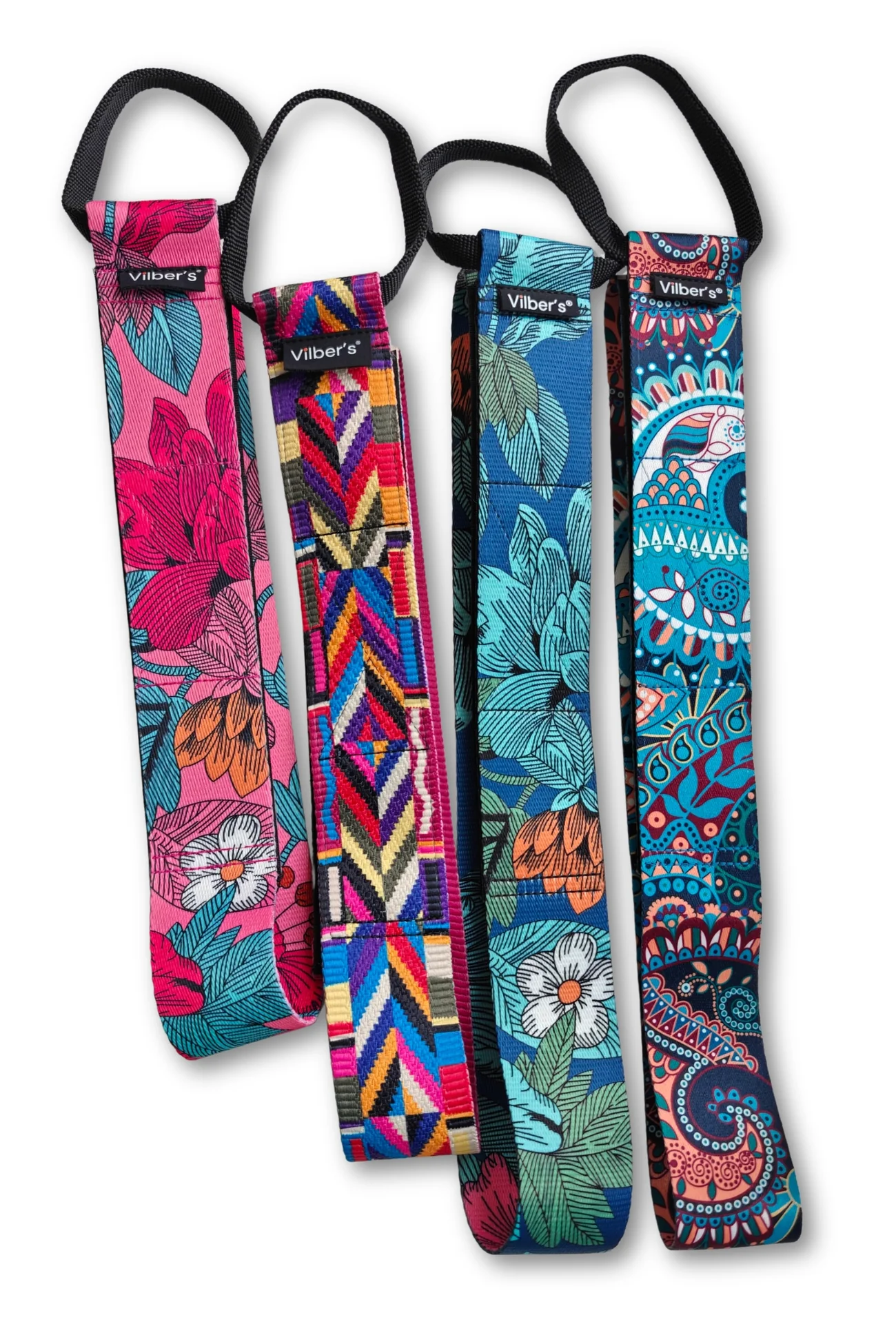 Four Wheelchair leg & body positioning strap in different striking colours and patterns