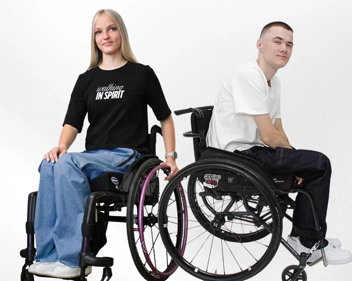 Vilbers male and female models in wheelchairs and Vilbers clothing