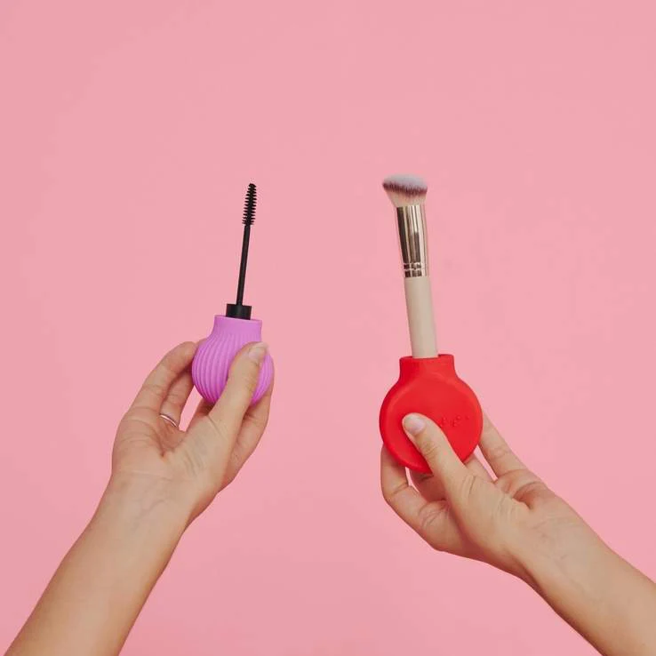 Round ball shape and paddle shape grip products Betty and Margie are shown