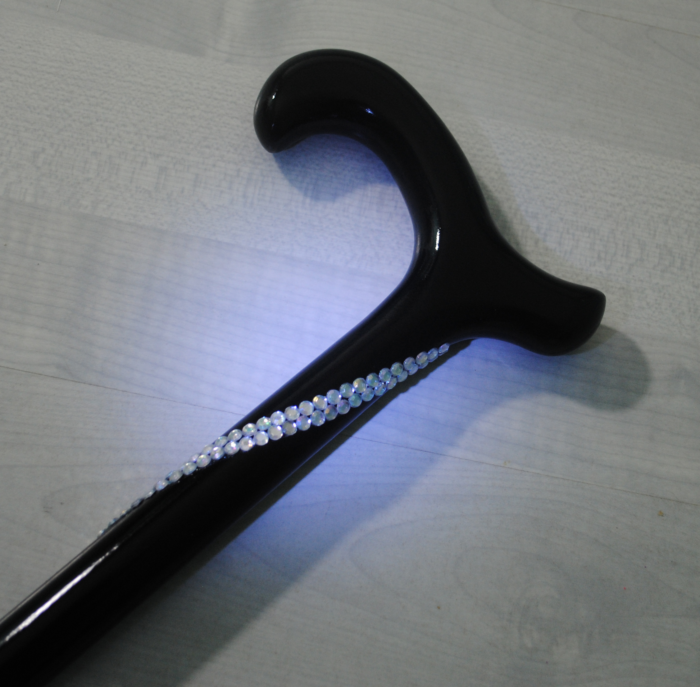 Blue and diamanté bewjelled walking stick with black handle