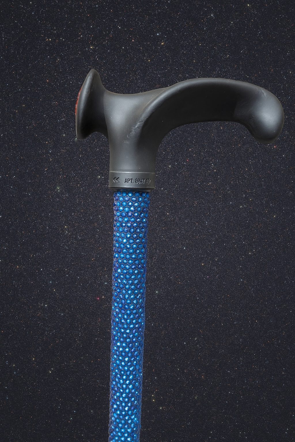 Blue bewjelled walking stick with black handle