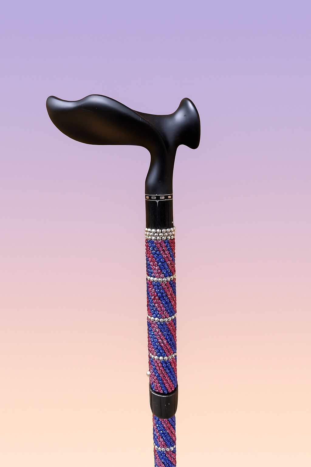 Blue and pink bewjelled walking stick with black handle
