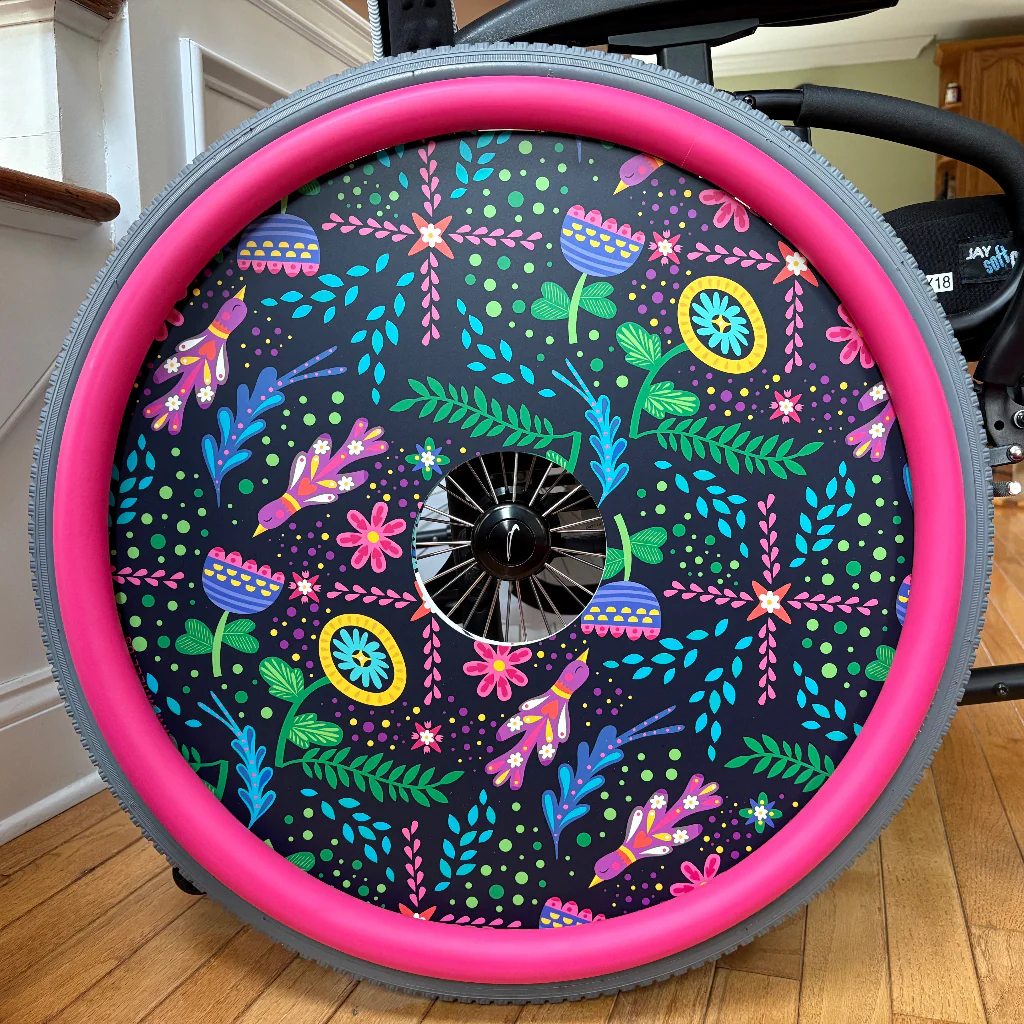 Bird and flower wheel cover with bright pink trim