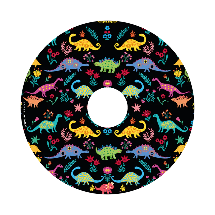 Coloured dinosaur design on black background wheel cover