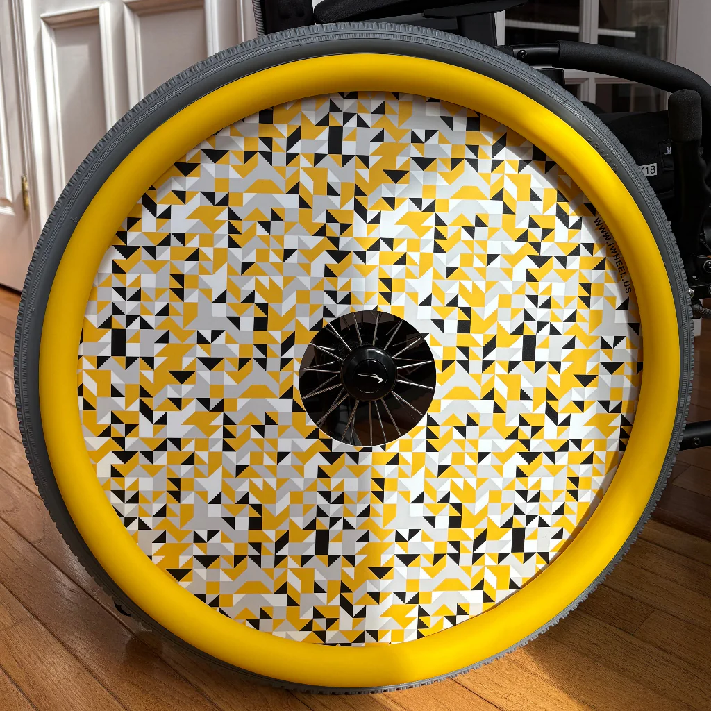 Graphic print wheel cover in yellow white and black with yellow trim