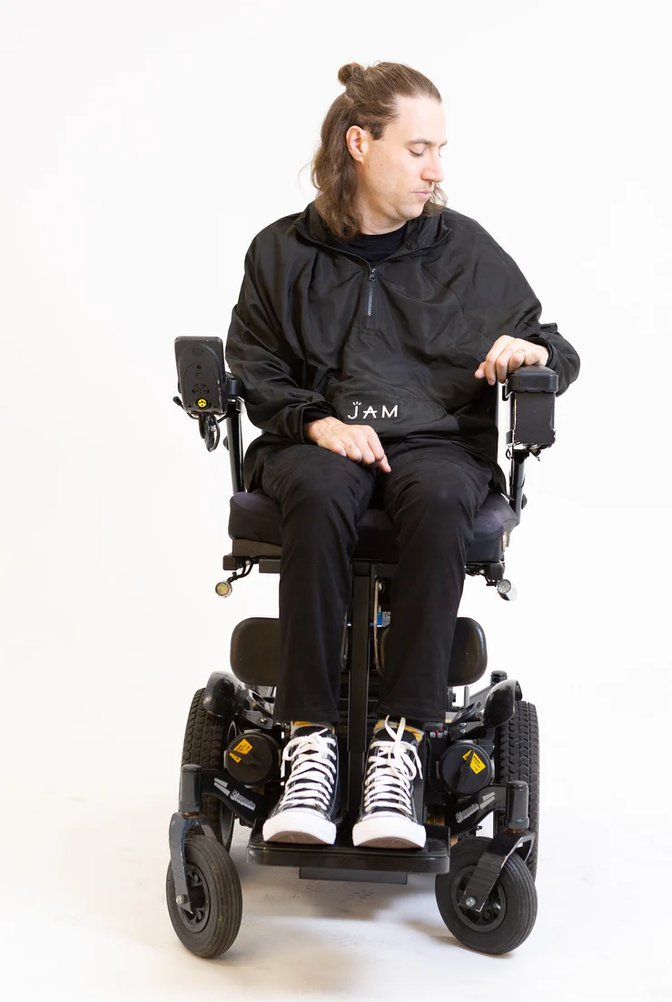 Black hoodie worn by wheelchair user