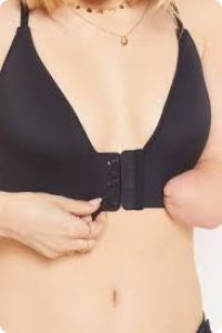 Close up of woman with limb difference wears black front fastening bra