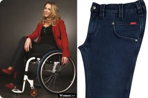 a woman in a wheelchair wearing rollitex jeans in dark denim, black top and red jacket, with a close up of the jeans to the side.