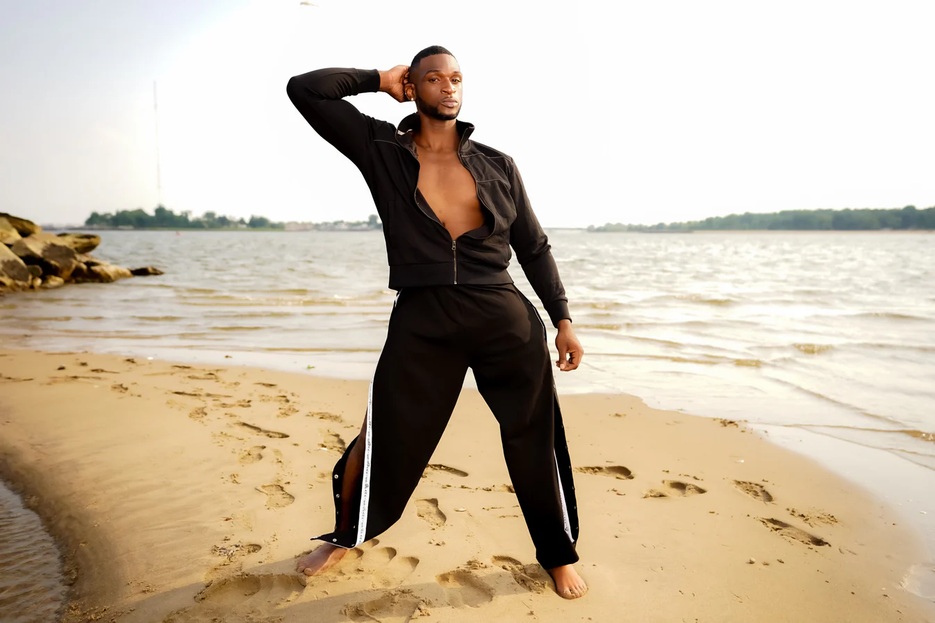 Man wears side seam opening trousers on the beach