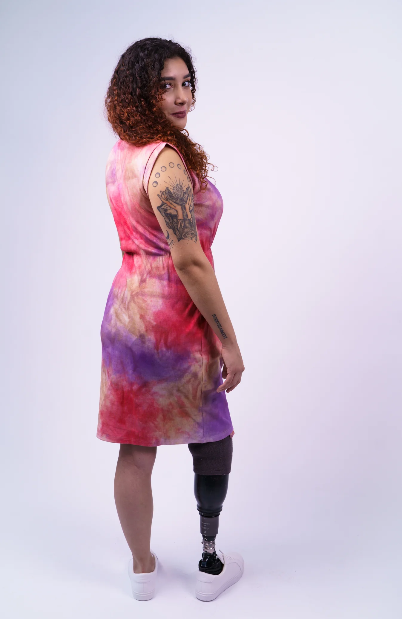 Woman wears tie dye surgery recovery dress