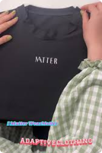 wear matters black t shirt with zip at collar and wear matters logo in white