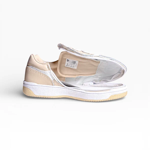 Womens trainer in pale peach shown fully open