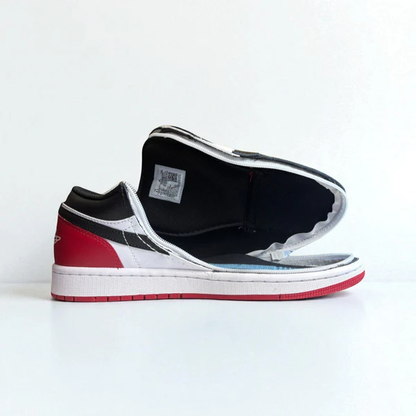 Black and red men's Nike trainer with shown fully open